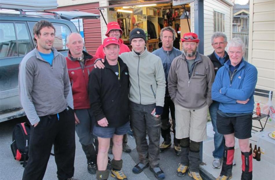 Estonian tramper Andre Lipand (26, centre) with the LandSAR Wanaka volunteers who rescued him...