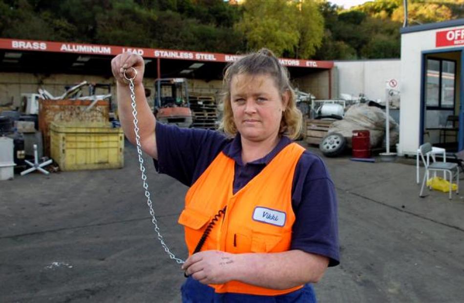 Everitt Enterprises purchasing yard supervisor Vikki Hewson yesterday shows the broken chain...