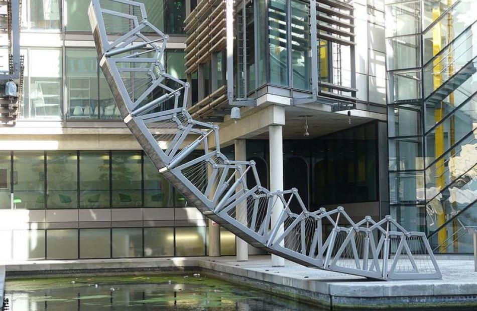 Examples of the work of contemporary British designer  Thomas Heatherwick. The Rolling Bridge,...