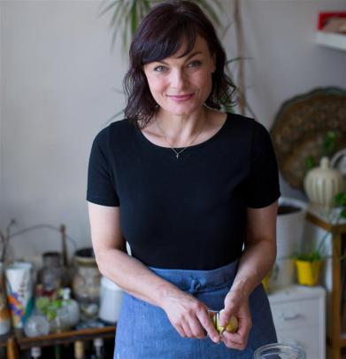 Kylee Newton works on her chutneys in her London kitchen. Photo: Philippa Langley.