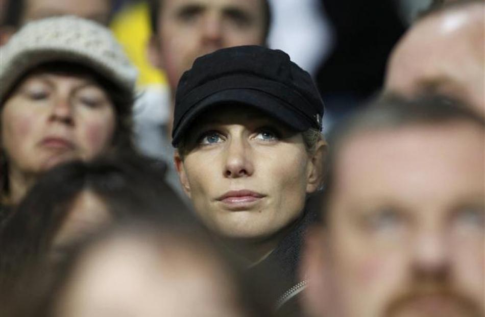 Eyes on the game. No hiding in a corporate hospitality box for Zara Phillips. REUTERS/Stefan Wermuth