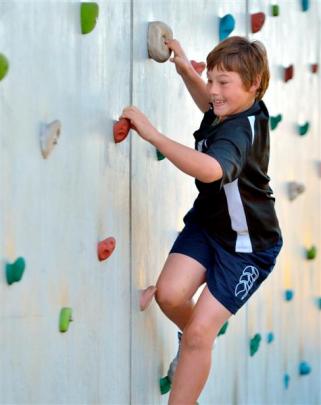 Fairfield School pupil Dominic Gullen (12) tries his hand at rock climbing. Photos by Gerard O...