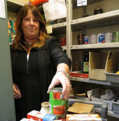 Family Works social work supervisor Debbie Gelling at work in the organisation's foodbank, which...