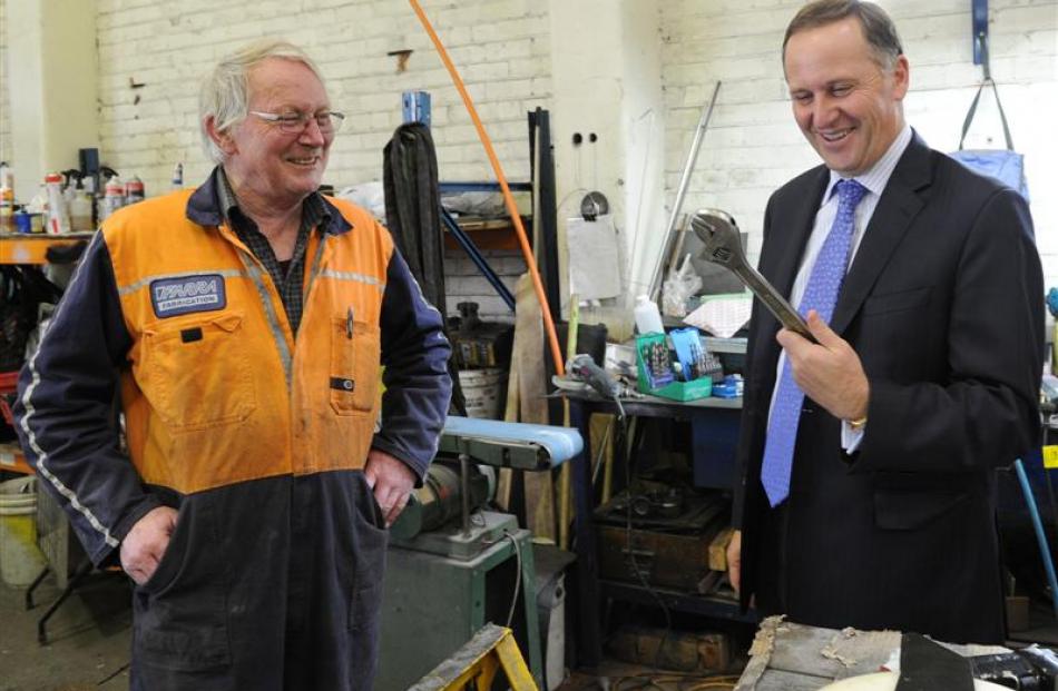 Farra Engineering worker Terry Smith talks to  Prime Minister  John Key when the  Mr Key  visited...