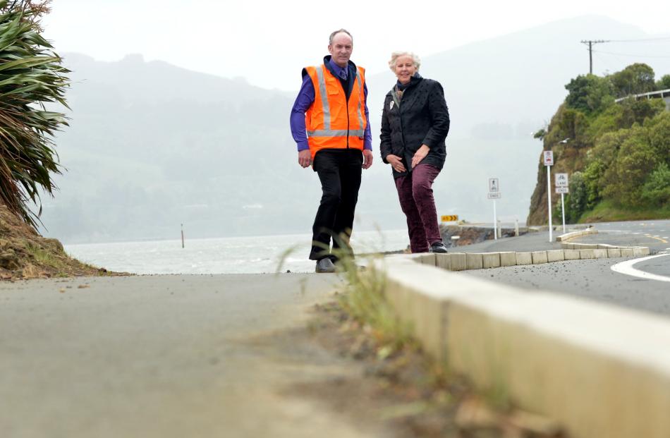 Council roading projects engineer Michael Harrison and Otago Peninsula Community Board Christine...