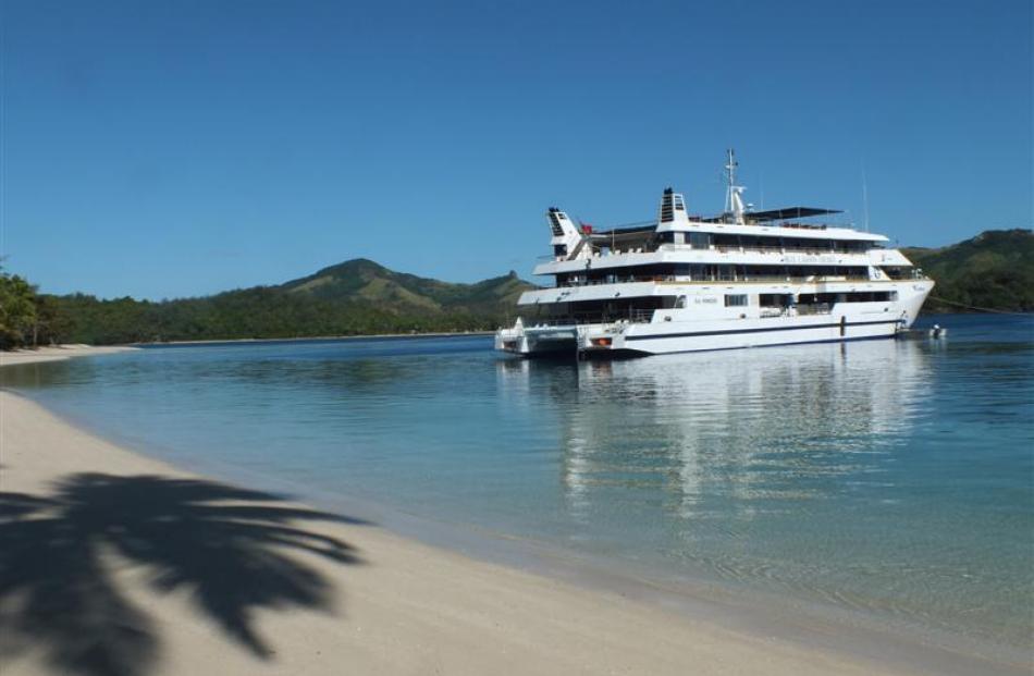 Fiji Princess alongside a typically peaceful beach in the Yasawas. Photos by Gillian Vine.