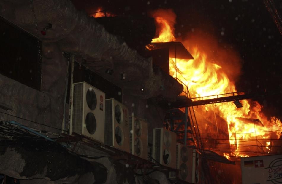 Fire breaks out at the Tiger Pub on Patong beach, in Phuket province, south of Bangkok. Four...