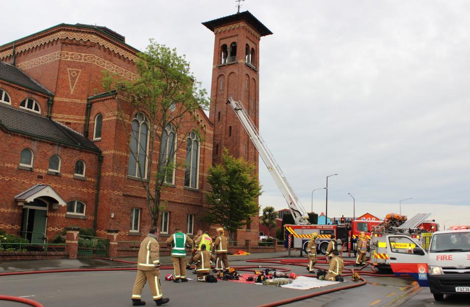 Fire crews were called to the First Presbyterian Church about 5.40am. Photo: Allison Beckham