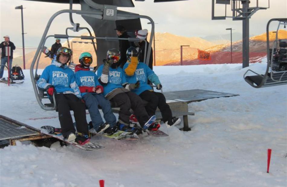 First on the chairlift at Coronet Peak for the 2014 season on Saturday were (from left) Cooper...