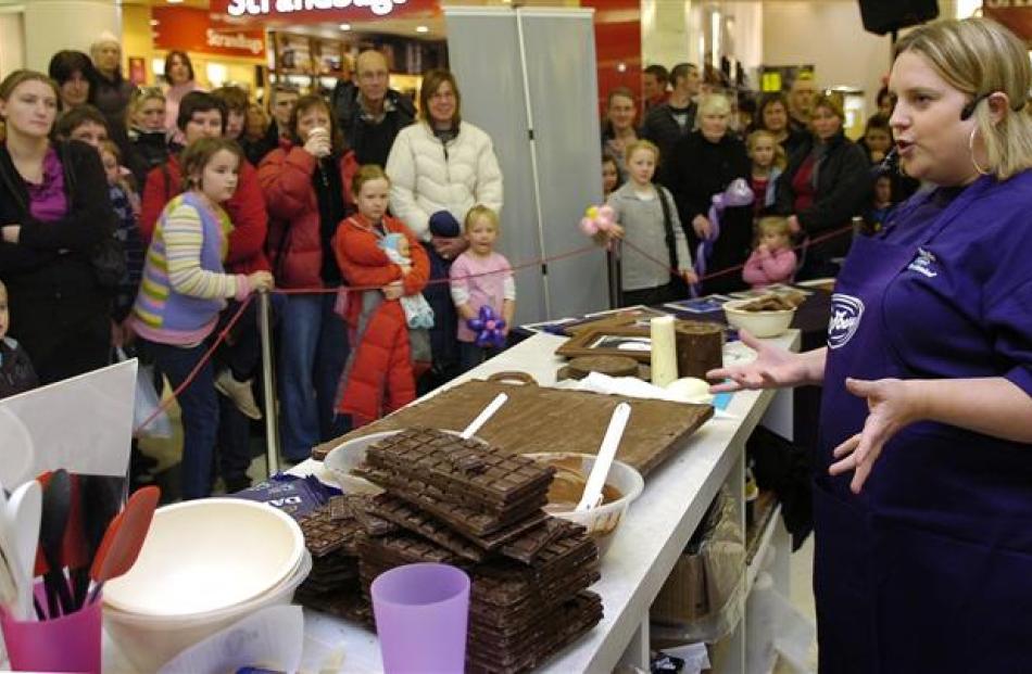 Food artist Prudence Staite demonstrates her chocolate food art at the Meridian Mall on Saturday....