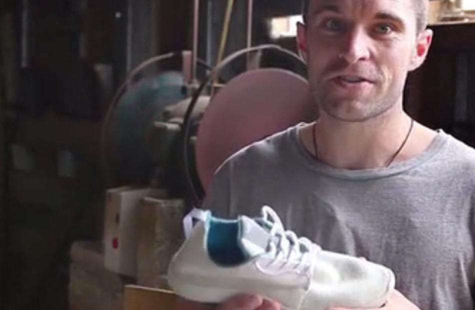 Former All White's skipper Tim Brown holding a Wool Runner prototype. Brown's start up company...