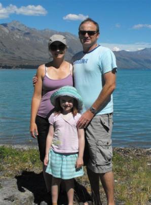 Former Queenstown locals Kiri, Garry and Aria Ferris, now living in Queensland,  stand at the top...