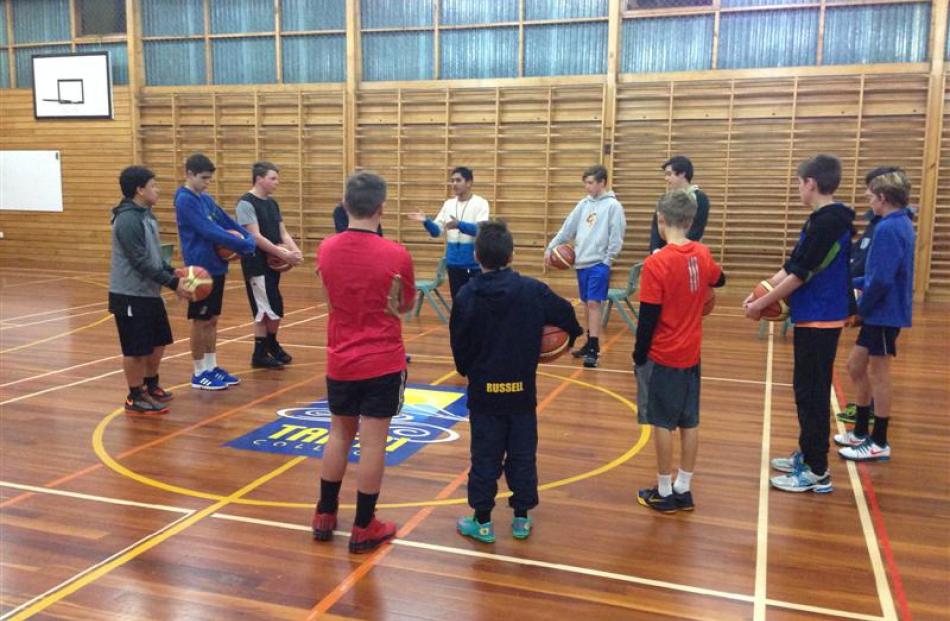 Former Taieri College sports prefect Bart Lind (centre) talks to pupils at a recent Taieri...