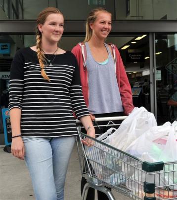 Fourth-year student sisters Gayla (23, left) and Natasha (21) Bonham-Carter shop for groceries...