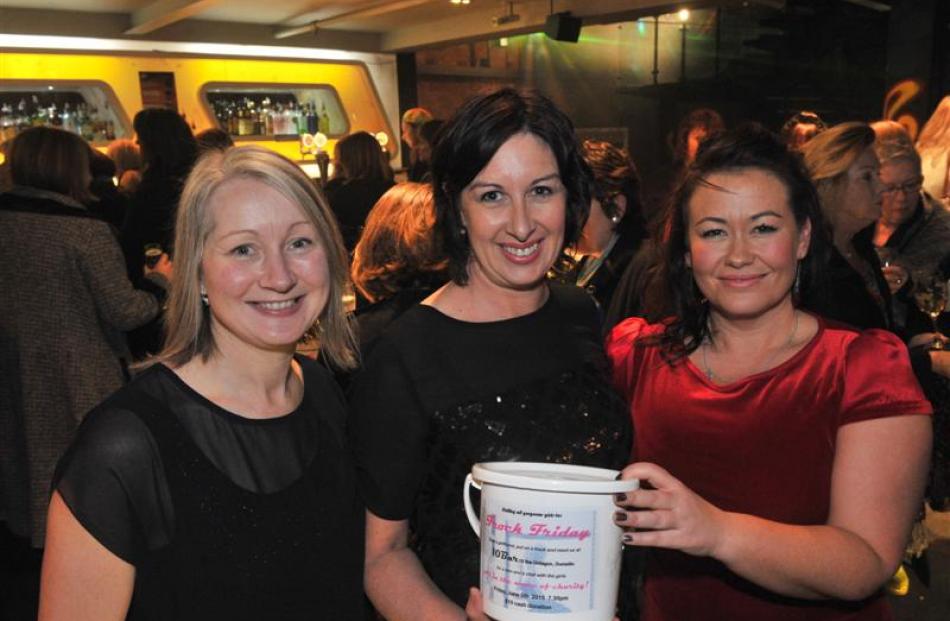 Frock Friday fundraising event organiser Bernadette Hyland (right) with Tracey Gamble (left) and...