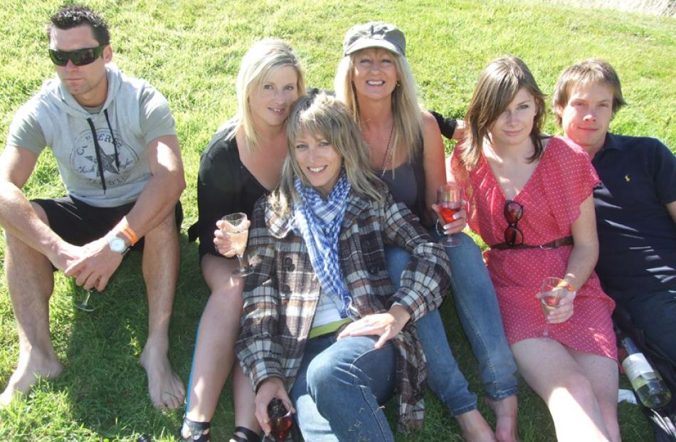 From left, Luke Bean and Justine McCall, of Arthur's Point, Holly Darling and Linda Cooley, both...