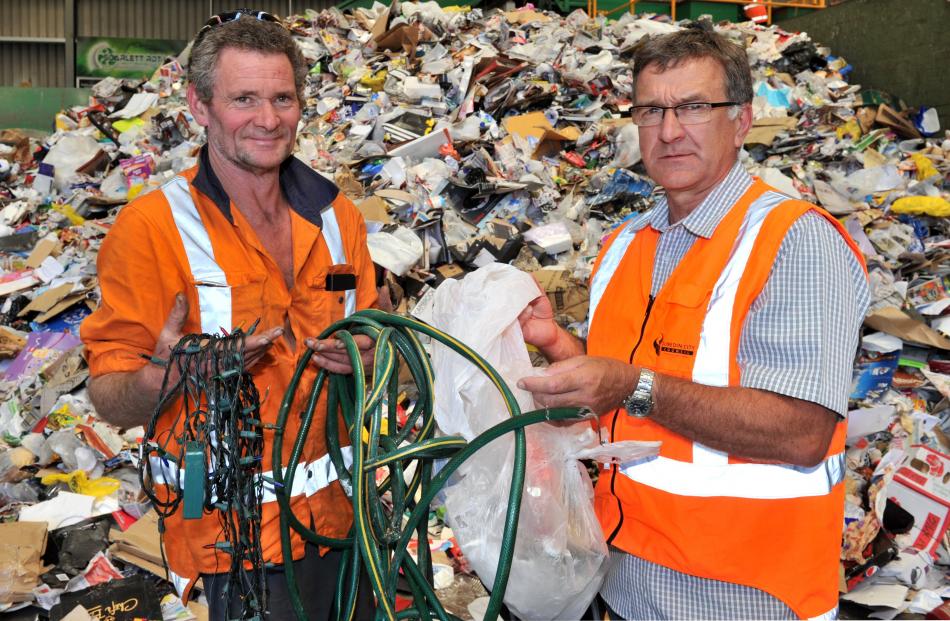 Fullcircle Recycling contractor Stephen Jones (left) and Dunedin City Council solid waste manager...