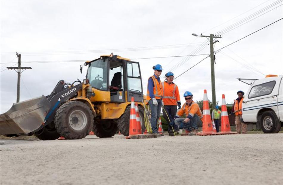 Fulton Hogan staff on site at a job in the garden city. The economies of both Auckland and...