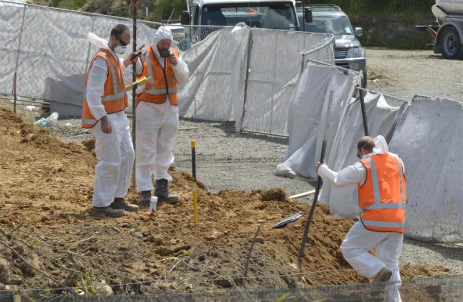 Fulton Hogan staff work on preparing the contaminated site at the former Glendermid Leathers...