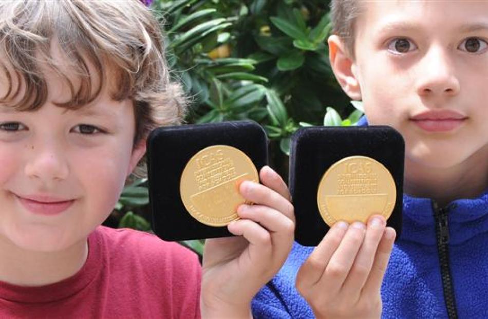 George Street Normal School pupils Paxton Hall (left) and William Scharpf with their gold medals ...