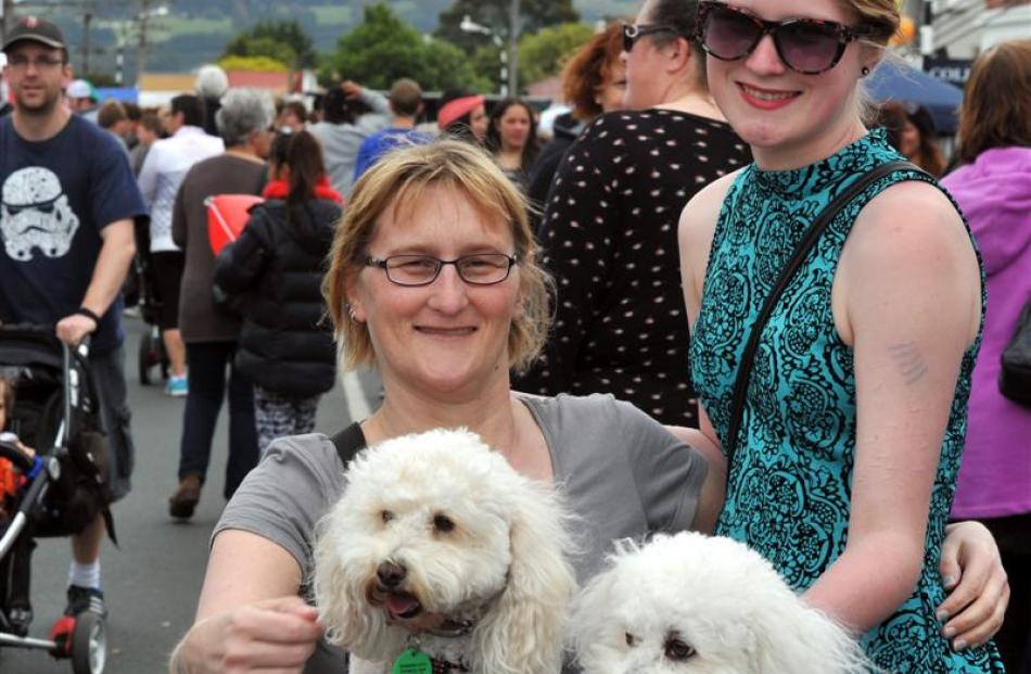 Melinda Gibbs, her dogs Sammy and Wookie, and daughter Maxine Buswell-Gibbs (17), all of Green...