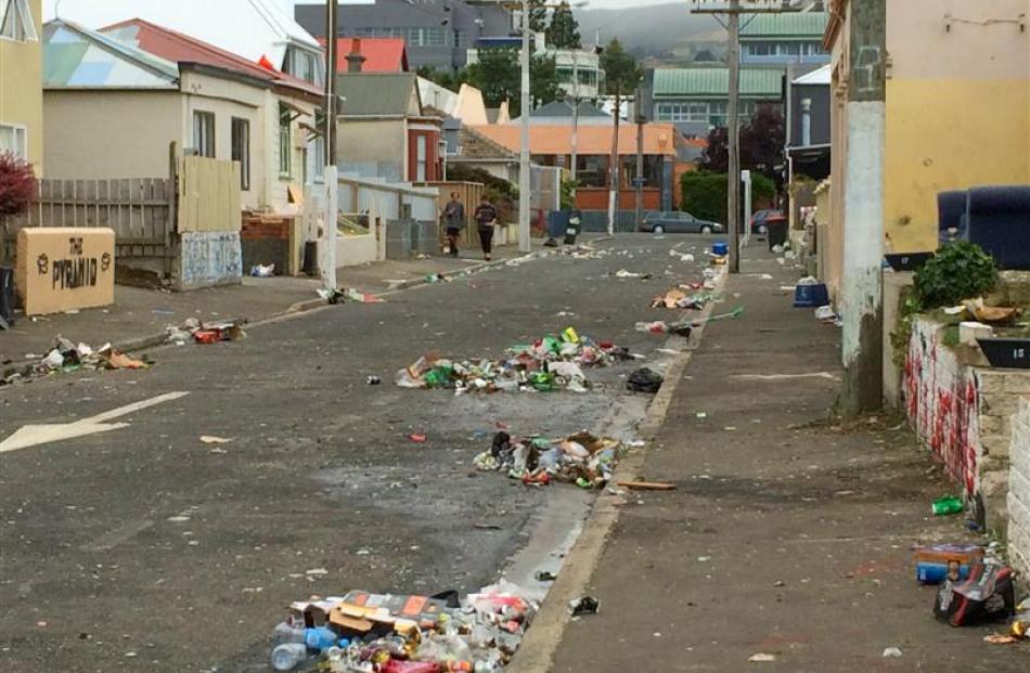 Glass and rubbish remain strewn over Hyde St yesterday.  Photo by Hamish McNeilly.