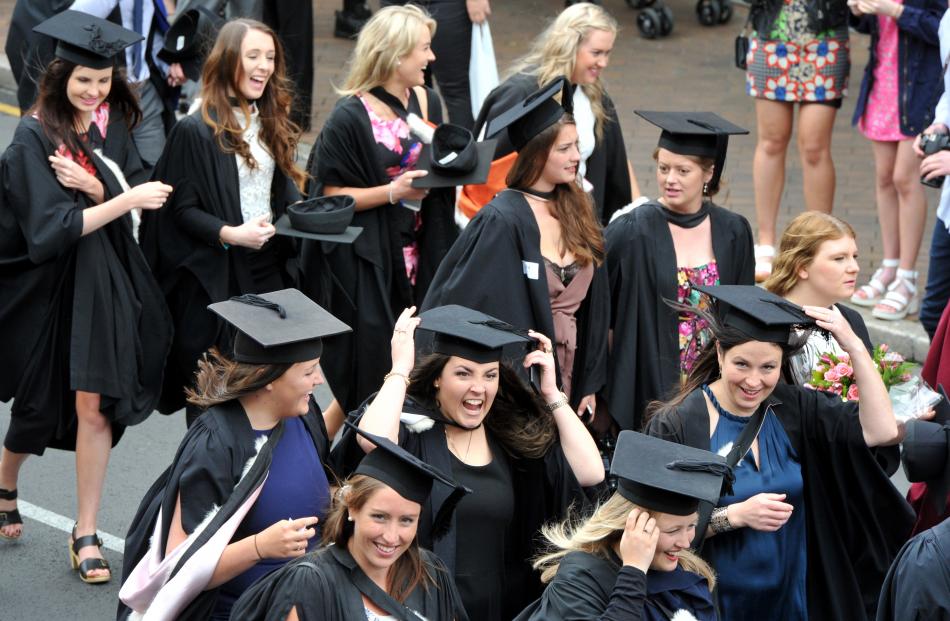 University of Otago graduands take part in a graduation parade along George St, Dunedin,...