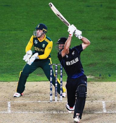 Grant Elliott of New Zealand pulls the ball away for four runs during the 2015 Cricket World Cup...