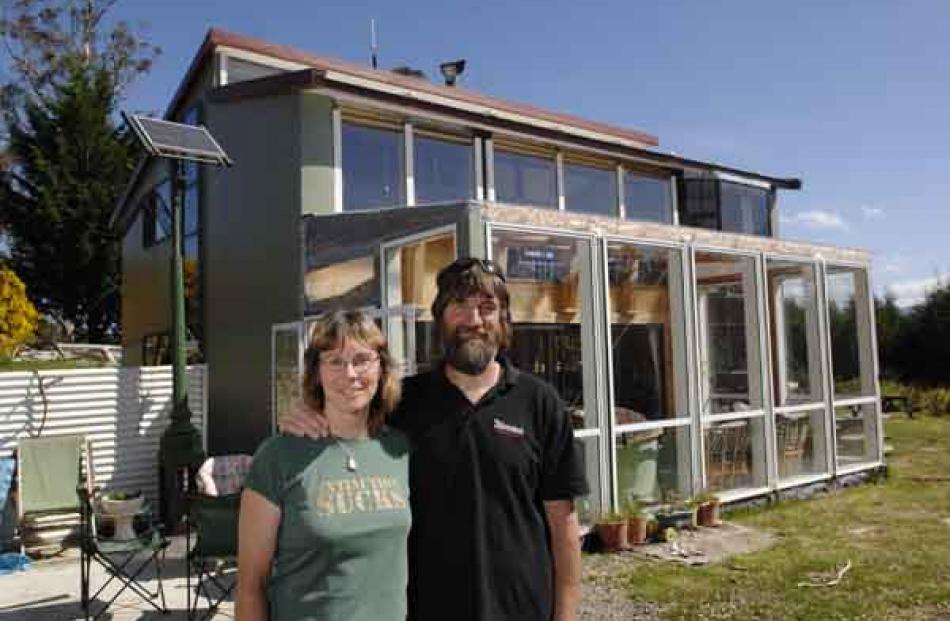 Jennie Upton and Murray Grimwood are so happy in their energy-efficient home off the Kilmog that...