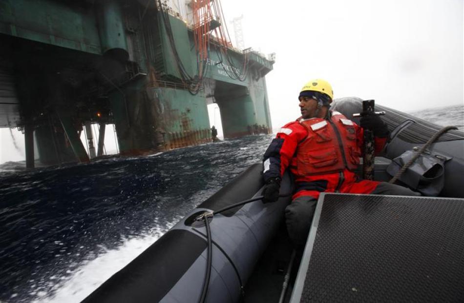 Greenpeace head Kumi Naidoo prepares to do battle last month in a Greenpeace oil protest in the...