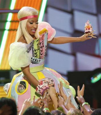 Greeting fans at Nickelodeon's Kids' Choice Awards last month. Photos b y Reuters.