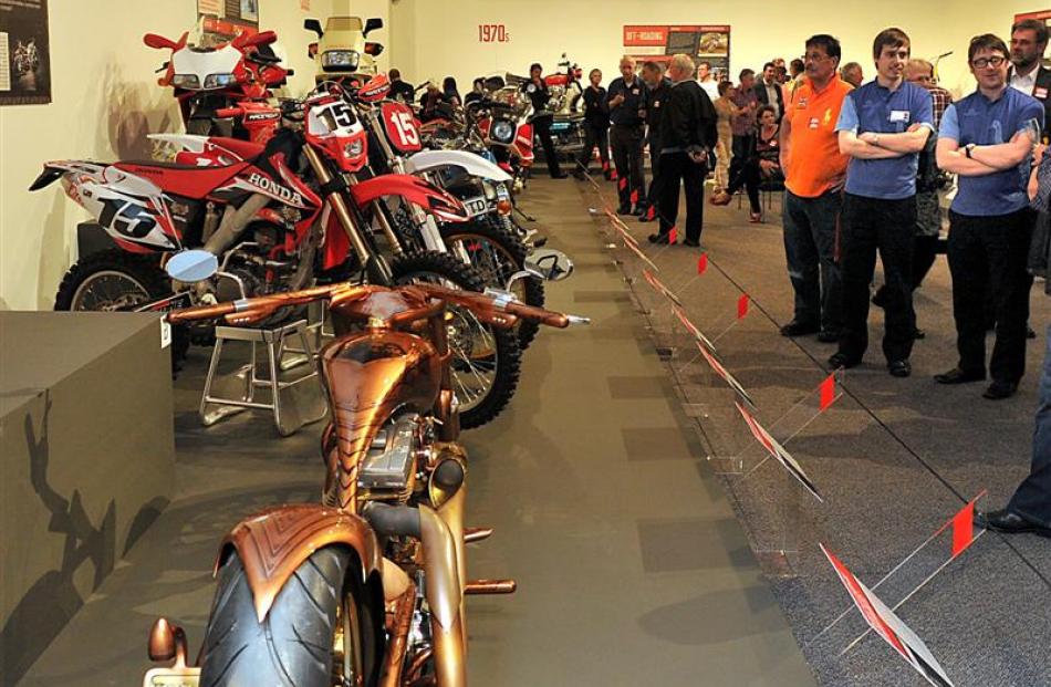 Guests and Otago Museum staff take a closer look at the many powerful machines before a big...