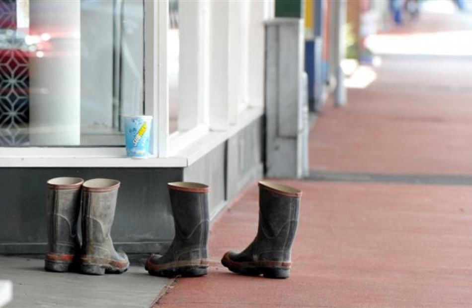 Gumboots lined up outside Postie clothing store on Gordon Rd. Photo by Craig Baxter.