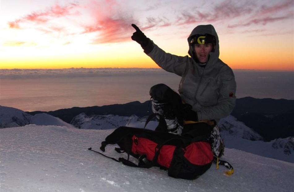 Guy McKinnon at the summit of Mt Tutoko last year. Photos supplied.
