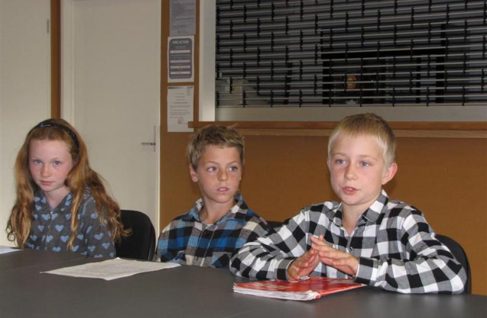 Hawea Flat School pupil Dylan Rimmer (10, right) has his say at a hearing in Lake Hawea yesterday...