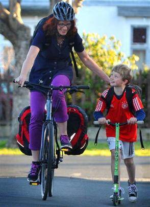 Heike Cebulla-Elder and her son Liam (8) in South Dunedin. Photo by Christine O'Connor.