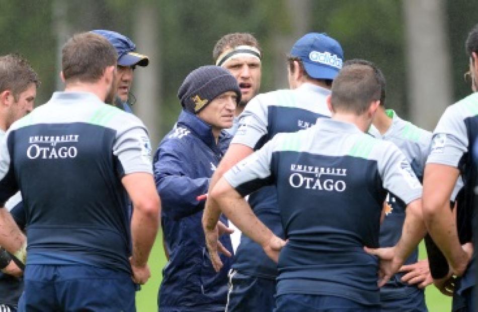 Highlanders assistant coach Tony Brown instructs a group of players at the team’s training...