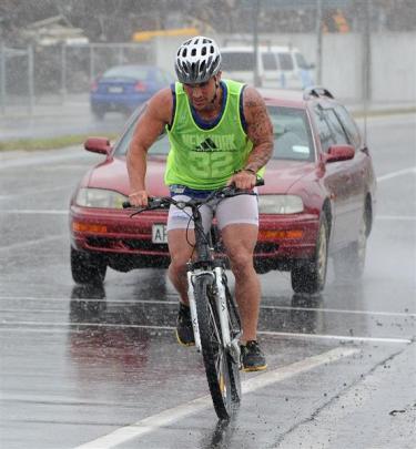 Highlanders players take part in a triathlon from Forsyth Barr Stadium to the St Clair Salt Water...