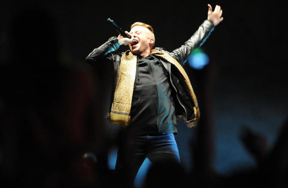 Rapper Macklemore makes the crowd roar at Forsyth Barr Stadium in Dunedin last night. Photo by...