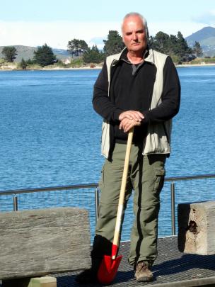 Hoani Langsbury takes a look around the little blue penguin public observation area. Photo by Dan...