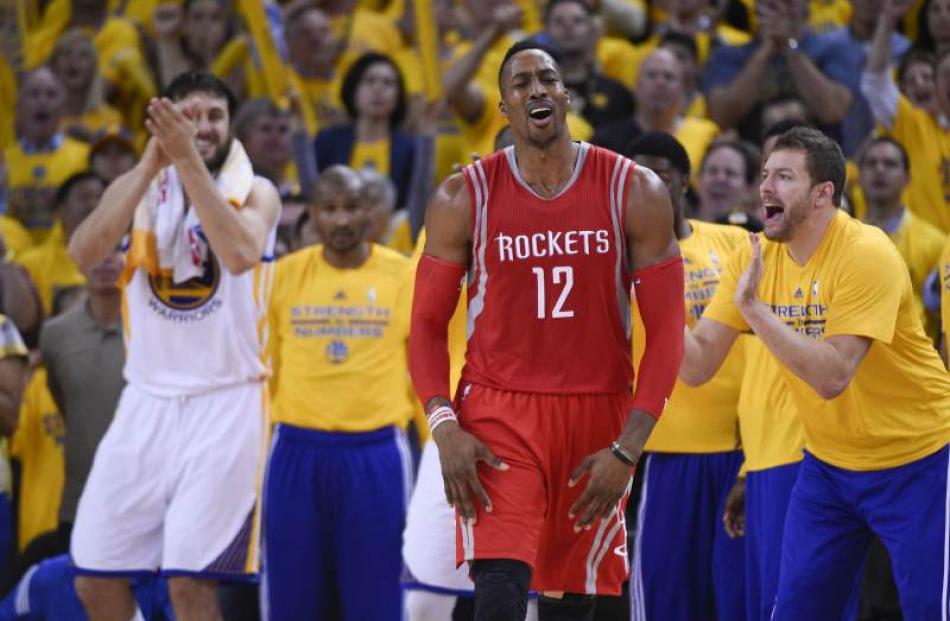 Houston Rockets centre Dwight Howard (12) reacts during the game against the Golden State...