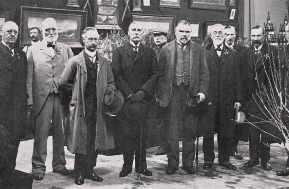 In the Government court at the Otago A. and P. Society's winter show (from left): Messrs John ...