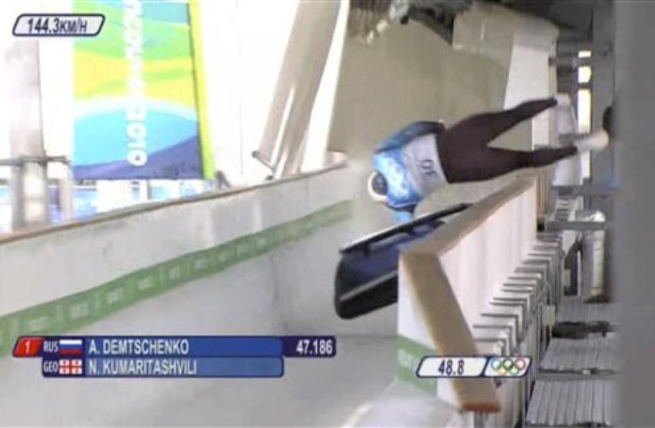 In this frame grab taken from video provided by the IOC Media Broadcast, Georgian luge athlete...