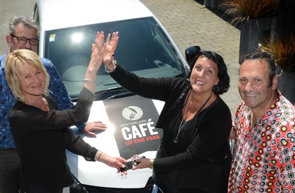 Ironic Cafe co-owner Sue Moller (right) celebrates with Marie Dunbar,  of co-sponsor Heinz...