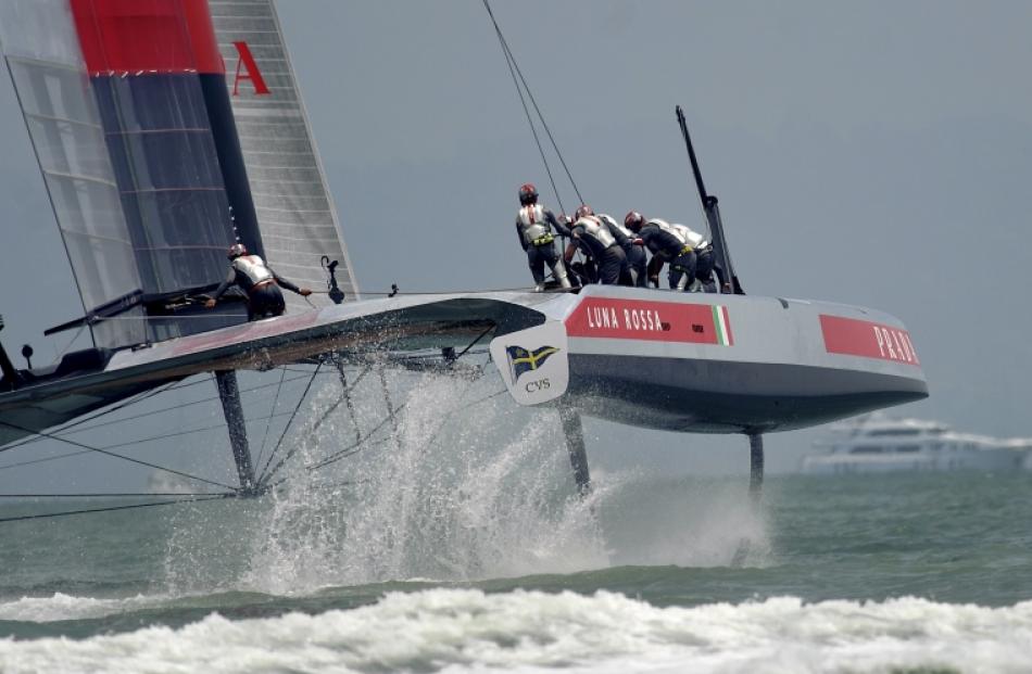 Italy's Luna Rossa Challenge sails the Louis Vuitton Cup race course in San Francisco, California...