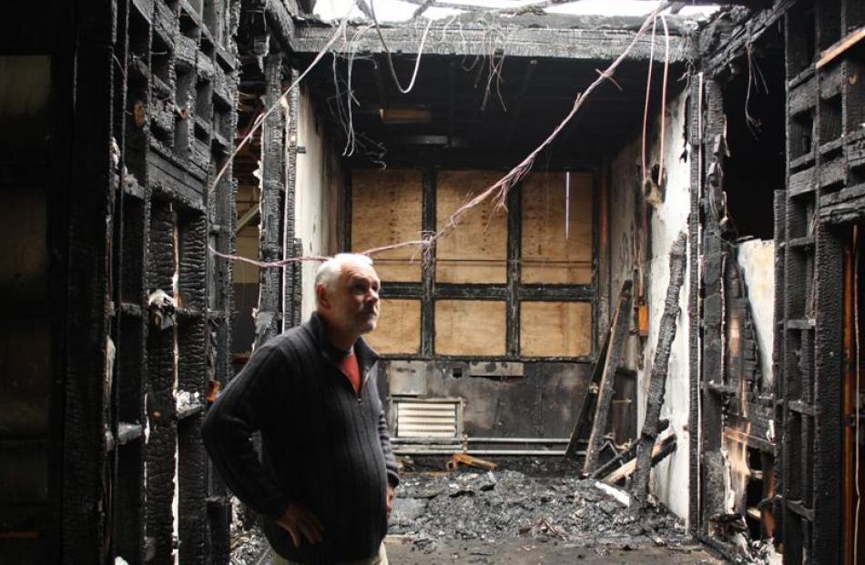 James Hargest College principal Andy Wood surveys arson damage at C Block on the senior campus,...
