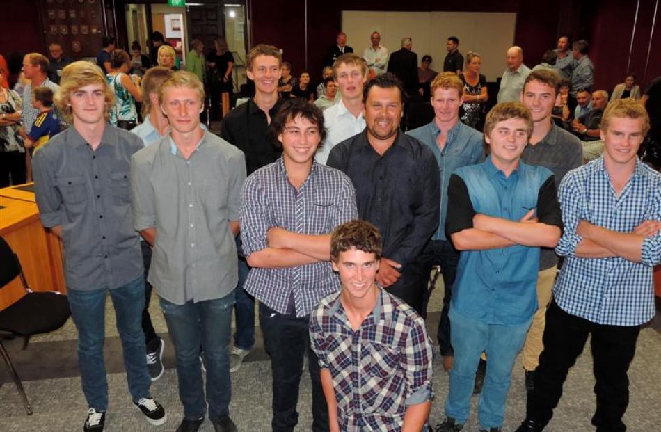 James McCullough (front) poses with his friends and rescuers at a ceremony at the Timaru District...