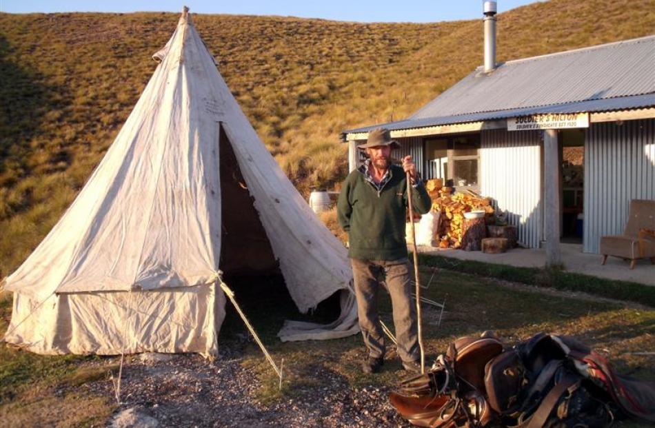 Jock Scott with the historic bell tent outside the Soldier's Hilton in the Soldiers Syndicate....