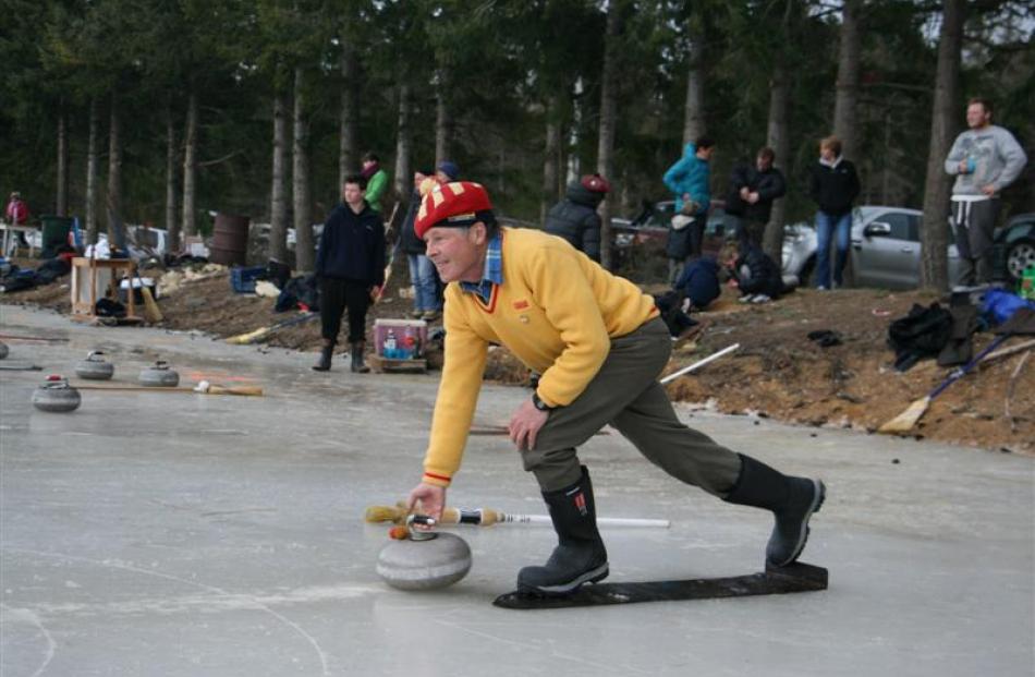 John Mulholland, of the Oturehua club, the moment before he delivers the stone across the rink....