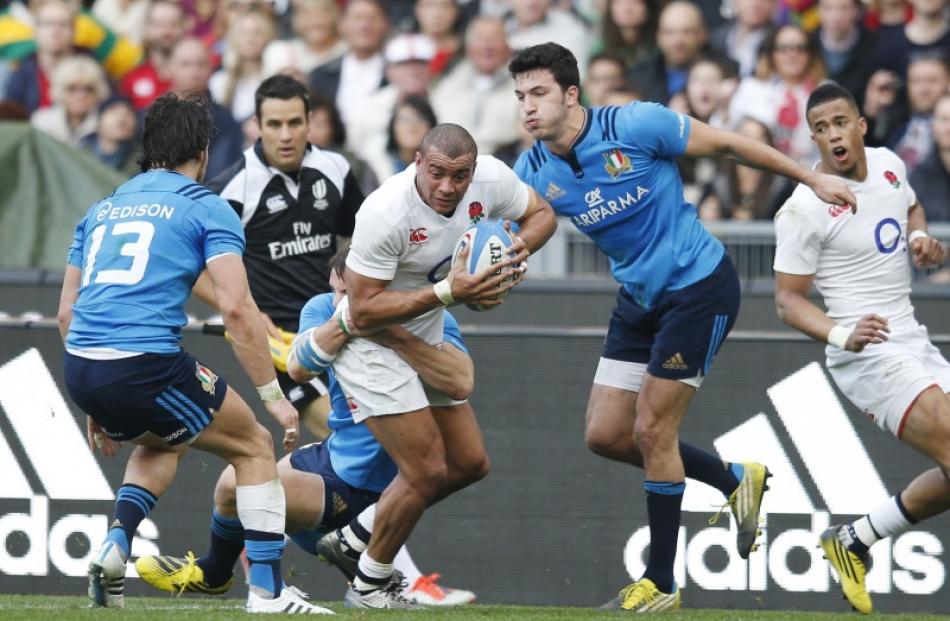 Jonathan Joseph with the ball for England. Photo: Reuters